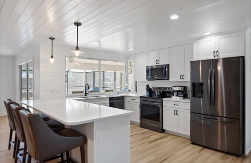 Shell Harbor Casa | Coastal Cottage on Canal, East End with Pool