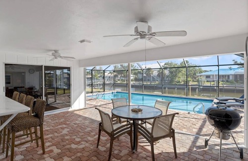 Shell Harbor Casa | Coastal Cottage on Canal, East End with Pool