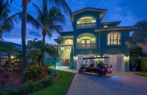 Indian Rocks Beach Casa | Coastal Elegance: Retreat with Heated Pool, Golf Cart, and Entertainment Haven