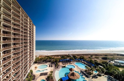 Windy Hill Condominio | Coastal Elegance 2BR Condo Jetted Tub and Balcony