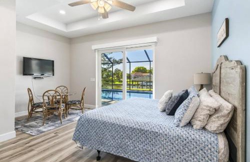 Palm Harbor Casa | Coastal Paradise Waterfront Pool Home
