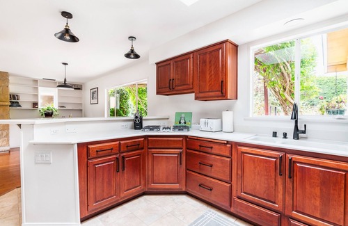 Padaro Lane Casa | Coastal ranch-style home in garden setting.