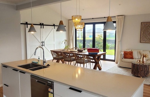 Papamoa Beach Casa | Coastal spacious 4-bedroom house close to beach with spa.