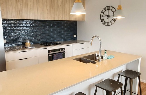 Papamoa Beach Casa | Coastal spacious 4-bedroom house close to beach with spa.