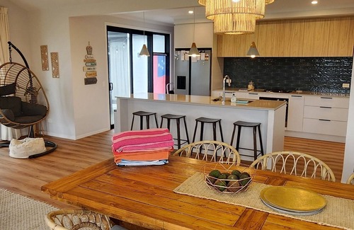 Papamoa Beach Casa | Coastal spacious 4-bedroom house close to beach with spa.