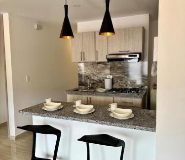 San Gil Apartamento | Cocina full, parqueadero y acceso a jacuzzi y bbq