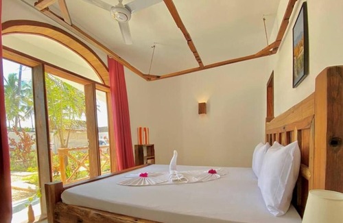 Pwani Mchangani Cama Y Desayuno | Coconut Getaway - 2 minutes from the beach