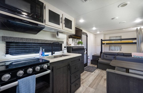 Brent Casa | Coleman Camper Backyard Oasis-Beaches-shopping-dining