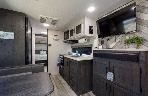 Brent Casa | Coleman Camper Backyard Oasis-Beaches-shopping-dining