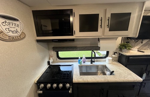 Brent Casa | Coleman Camper Backyard Oasis-Beaches-shopping-dining