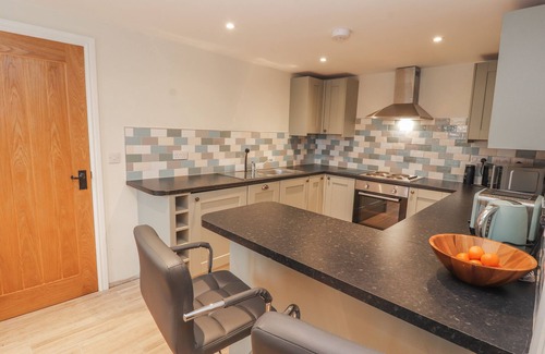 Northop Hall Cabaña | COLOMENDY ALPACA FARM - COACH HOUSE, family friendly in Northop Hall