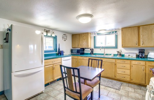 Campbellsport Cabaña | Colorful Cottage w/ Hot Tub - Steps to Long Lake!