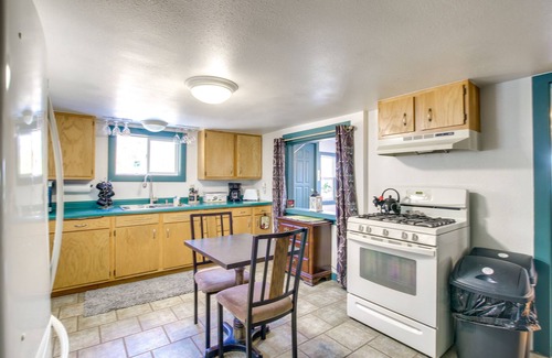 Campbellsport Cabaña | Colorful Cottage w/ Hot Tub - Steps to Long Lake!