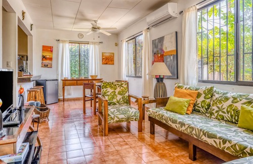 Barrio Ricos y Famosos Casa | Colorful, dog-friendly home with private pool, W/D, & lush setting