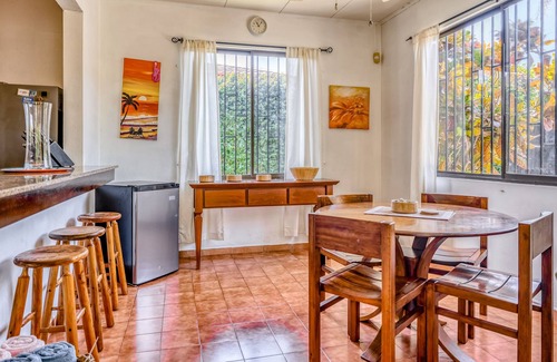 Barrio Ricos y Famosos Casa | Colorful, dog-friendly home with private pool, W/D, & lush setting