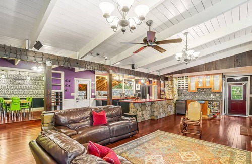 Shoreline Casa | Colorful dog-friendly getaway with covered deck, firepit, fast WiFi, & grill