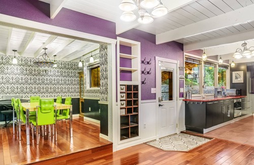 Shoreline Casa | Colorful dog-friendly getaway with covered deck, firepit, fast WiFi, & grill
