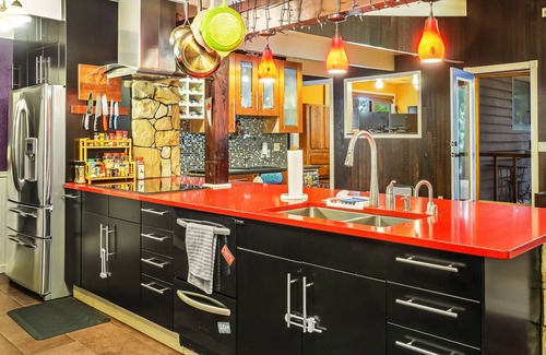 Shoreline Casa | Colorful dog-friendly getaway with covered deck, firepit, fast WiFi, & grill