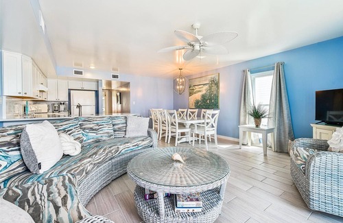 East End Casa | COME AND ENJOY this beautifully decorated beachfront townhome where you can soak up the sun!