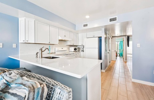 East End Casa | COME AND ENJOY this beautifully decorated beachfront townhome where you can soak up the sun!