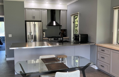 Cedar Condominio | Come cozy up next to the fireplace at our contemporary condo centrally located