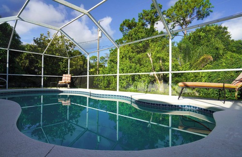 Sebastian Highlands Casa | Come Home to Paradise…. Screened in pool with covered lanai and hot tub