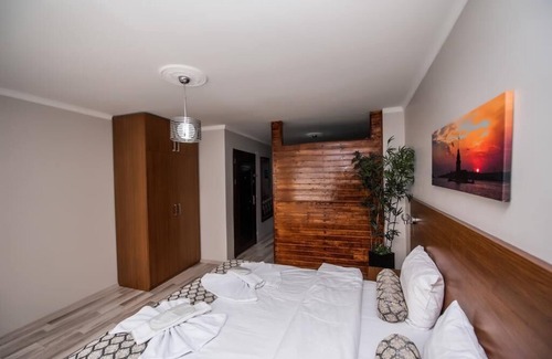Emin Sinan Apartamento | Habitación Triple Confort con Kichenette