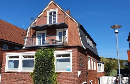 Juist Apartamento | Comfort vacation apartment with south-facing balcony and unique view of the mudflats