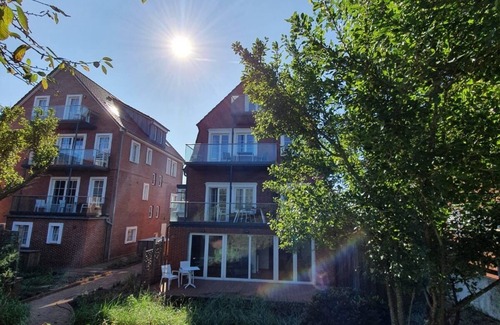 Juist Apartamento | Comfort vacation apartment with south-facing balcony and unique view of the mudflats