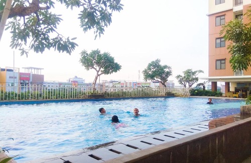 Bekasi Timur Apartamento | Comfortable 2BR Lagoon Resort Apartment By Travelio