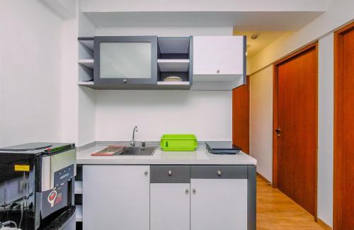 Kayu Putih Apartamento | Comfortable and Warm 2BR at Tifolia Apartment By Travelio