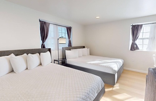 Cape May Hotel | Comfortable Coastal Retreat with Two Queen Beds & Sleeper Sofa - Suite Room