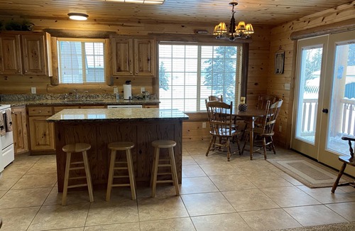 Last Chance Cabina | Comfortable cozy cabin, accessible to Snowmobile & ATV trails & Fly Fishing