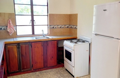 Calibishie Casa | Comfortable, local home with A/C and private verandah
