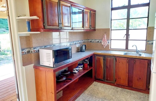 Calibishie Casa | Comfortable, local home with A/C and private verandah