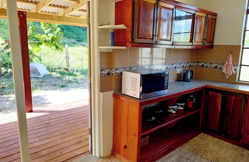 Calibishie Casa | Comfortable, local home with A/C and private verandah