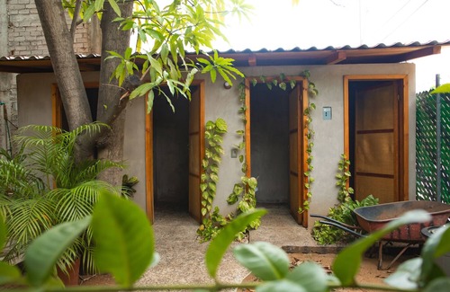 Puerto Escondido Casa | Cuartos cómodos en un bello espacio hogareño
