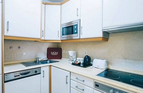 Areias de Sao Joao Hotel | Comfortable Stay! Spacious 1BR with Kitchenette, Free Parking, 2 Onsite Pools!