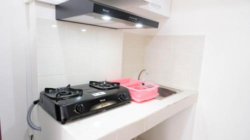 Surabaya Apartamento | Comfy 2BR Apartment at Puncak Kertajaya Surabaya near ITS By Travelio