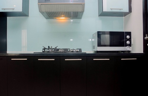 Setiabudi Apartamento | Comfy and Spacious 2BR The Masterpiece Epicentrum Apartment By Travelio
