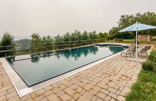 Montone Apartamento | Cómoda casa de vacaciones en Montone con jardín