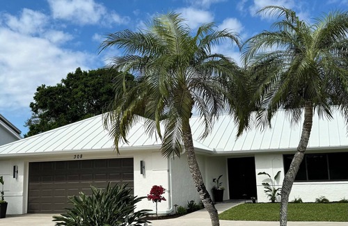 Palm River Estates Casa | Completely renovated 3-bedroom, heated pool home, privacy, near Naples beach!