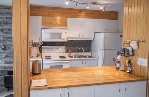 Saint-Philemon Chalet De Esquí | Condo Thibault 117 – Condo at the foot of the Massif du Sud