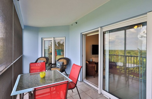 New Smyrna Beach Condominio | 🌴🐠Condo w/ Short Walk to Private Beach Access 🏖️ & Loaded w/ Amenities 🌊🎾🏀