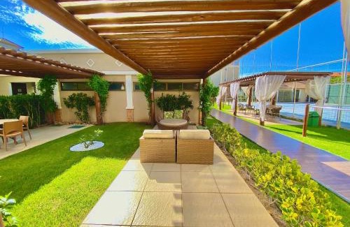 Porto das Dunas Casa | Condomínio Mediterranee Residence por Be My Guest