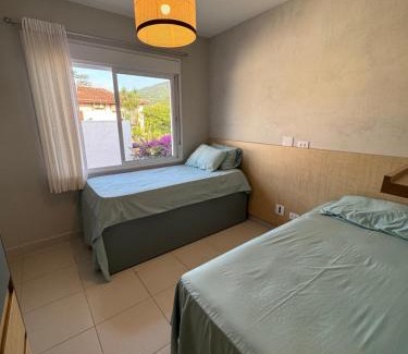 Boicucanga Beach Casa | Condomínio pé na areia, super novo e confortável.