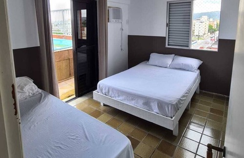 Parque Enseada Apartamento | Confortável cobertura com piscina privativa
