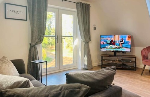 St Albans Apartamento | Contemporary Loft Annexe in spacious grounds next to golf club.