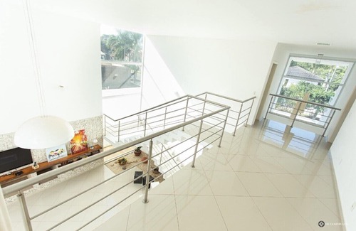 Estancia das Flores Casa | Casa de estilo contemporáneo con 4 suites y 6 baños en una comunidad cerrada