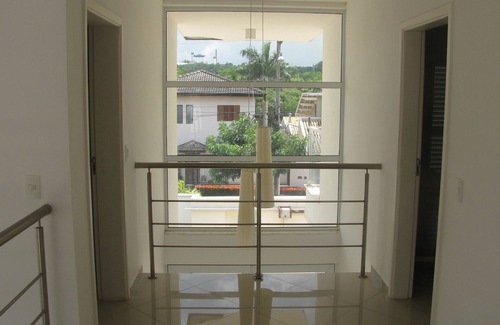 Estancia das Flores Casa | Casa de estilo contemporáneo con 4 suites y 6 baños en una comunidad cerrada